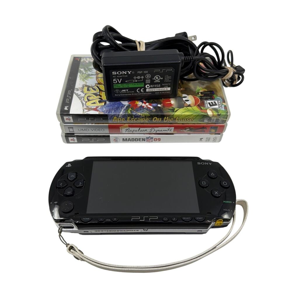 SONY PSP-1001 Black Console W/ Charger, New Battery, 2GB Memory Stick & Games